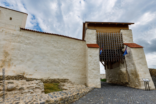 The Gate of the Marienburg Castle in Feldioara in Romania photo