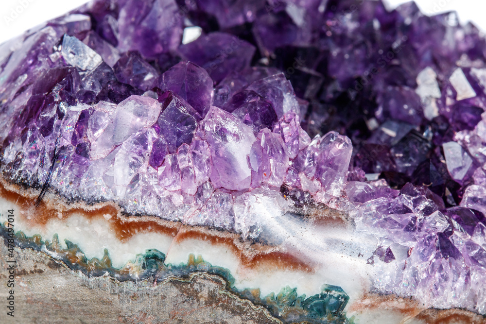 Amethyst Crystal Druse macro mineral on white background Amethyst Crystal Druse macro mineral on white background