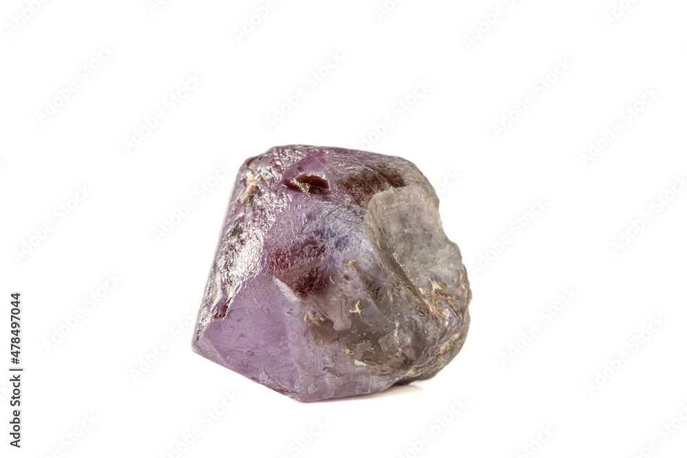 macro mineral stone alexandrite red - violet in daylight on a white macro mineral stone alexandrite red - violet in daylight on a white