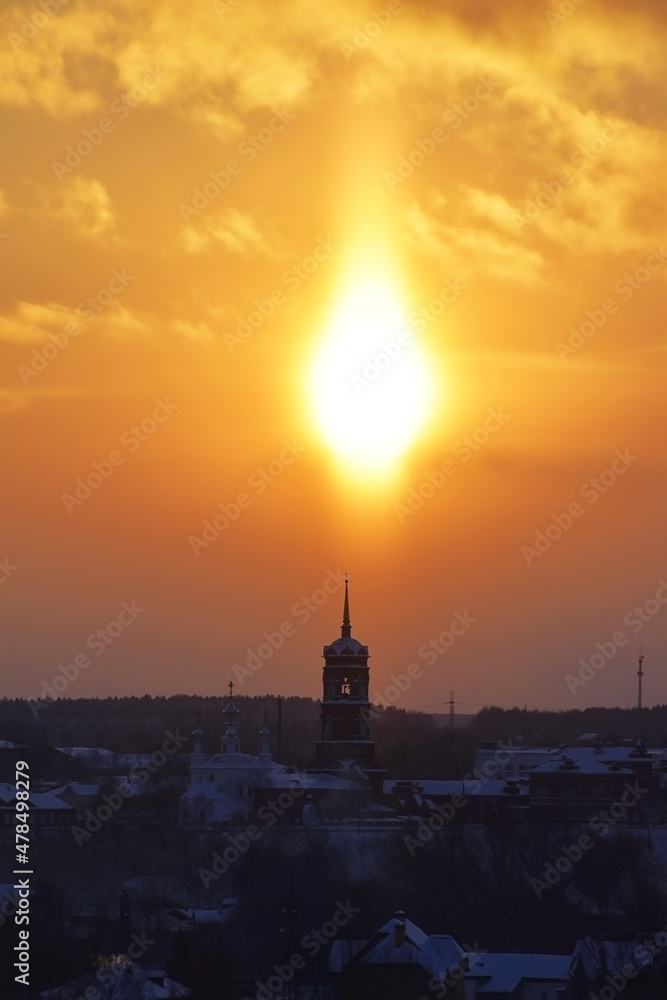 Pillar-shaped halo at sunset