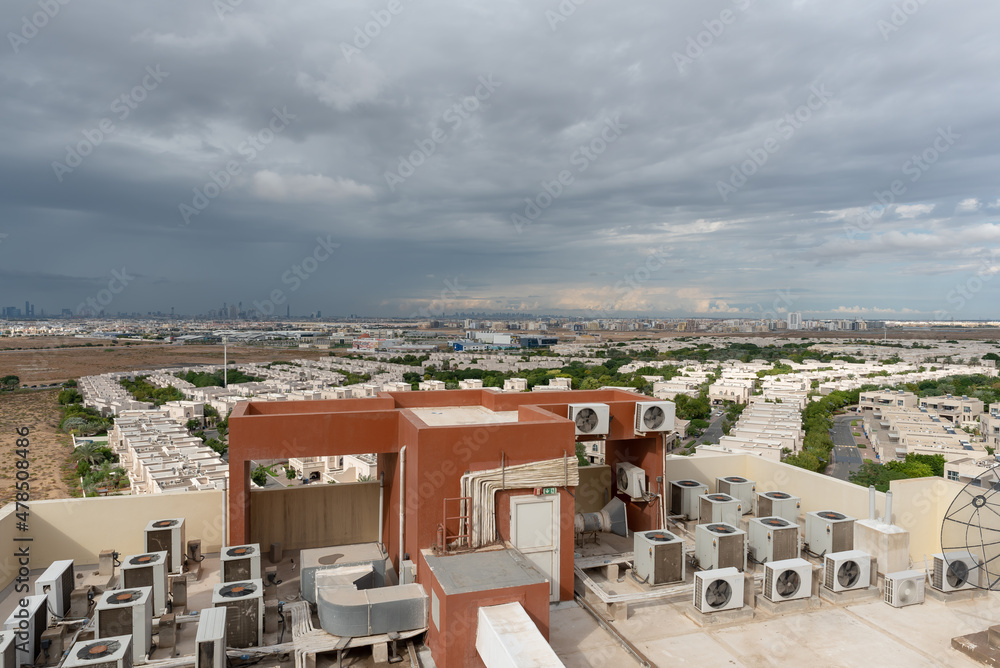 Fototapeta premium Dubai, United Arab Emirates – January 01, 2022, The Dubai skyline view for top of the building from Dubai Silicon Oasis (DSO) at rainy day