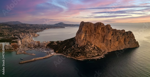 Sunrise over Calpe city and Penyal d Ifac Natural Park photo