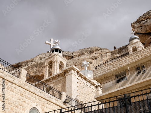 SYRIA. Maalul Monastery is located 60 km from Damascus. Nearby is the village of Kalamondin resembling an eagle's nest. The houses are built on the rocks by steps.