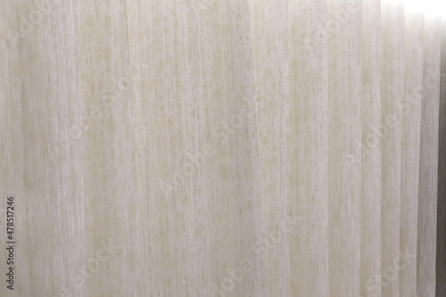 background photo of ivory white color curtain in the luxury bedroom of the hotel
