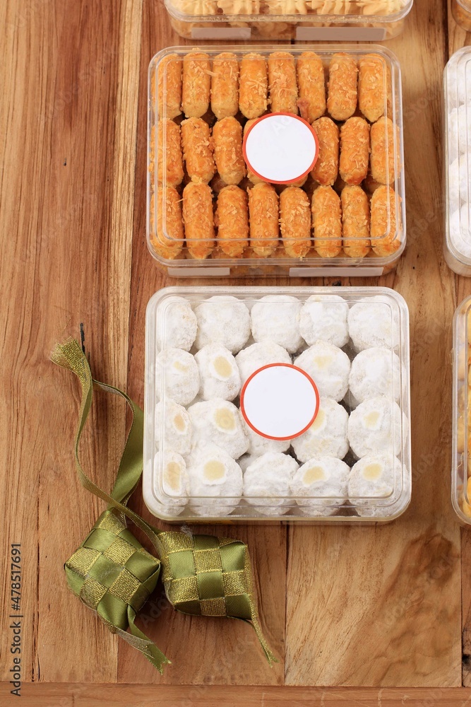 Various Lebaran Cookies Parcel on White Background. Copy Space for Text. Hantaran Kue Kering Lebaran Concept Various Lebaran Cookies Parcel on White Background. Copy Space for Text. Hantaran Kue Kering Lebaran Concept