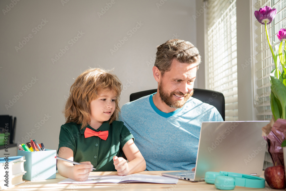 happy father and child son at school working online on laptop, family happy father and child son at school working online on laptop, family