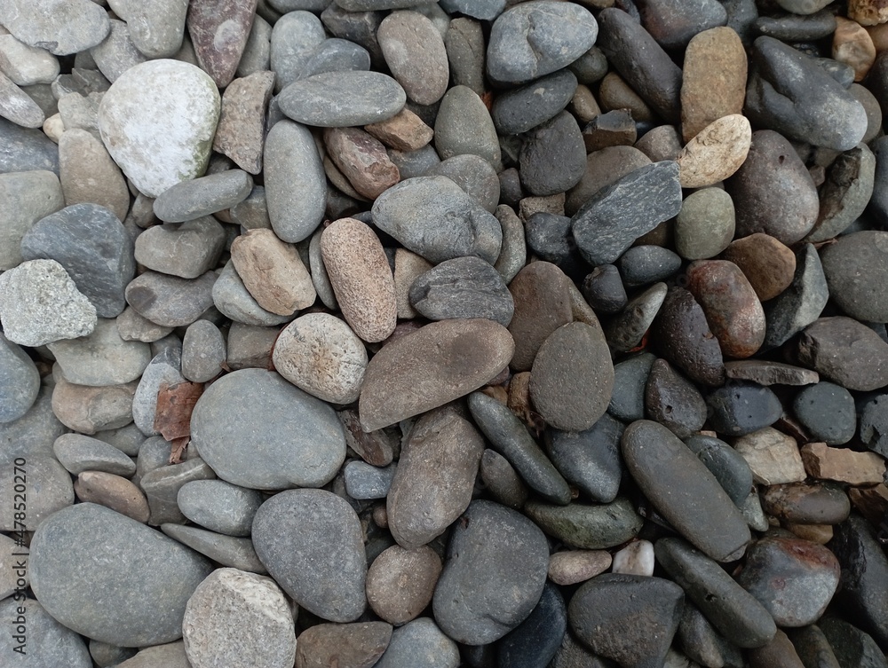 abstract background with round pebble stones. Vacation holiday recreation on beach concept. abstract background with round pebble stones. Vacation holiday recreation on beach concept.