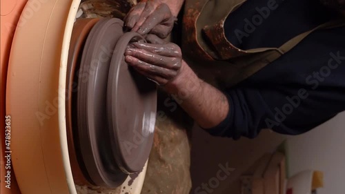 master's transformation of clay into ceramic design with artistic touches