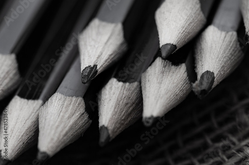 black and white abstract selective focus of graphite pencils