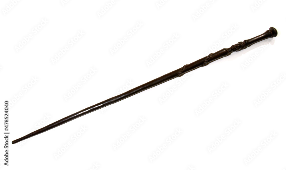 African wooden walking stick isolated on white Background. African wooden walking stick isolated on white Background.