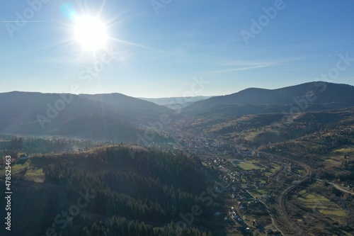 Ukraine, Carpathians, Slavsk, Slavs'ke, Lviv Oblast, morning village in the mountains, morning mountains in the fog, drone