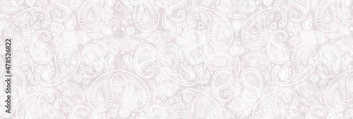 Pastel color background with white paisleys pattern. Indian style ornament.