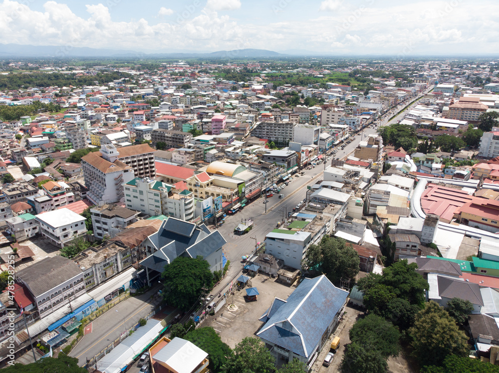 Fototapeta premium Aerial view from a drone that shows the border town of Mae Sai District, Thailand, And international immigration Tachileik District Of Myanmar