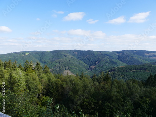 View from the circular path of the Glinge pumped hydroelectric energy storage, North Rhine-Westphalia, Germany, of the mountains and forests of the Sauerland