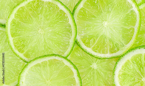 Lime slices pattern, food background. Top view, overhead
