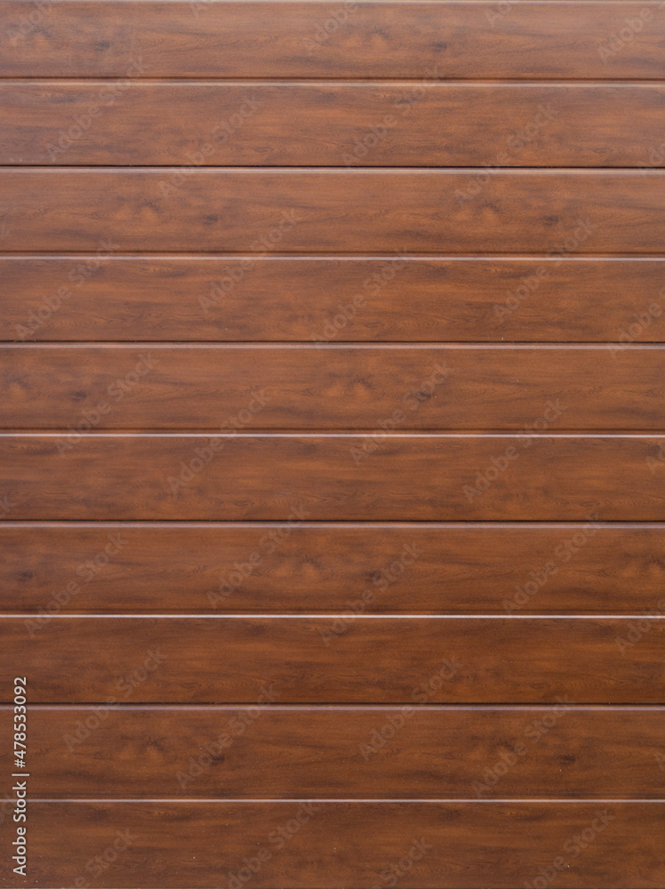 Wood texture with horizontal lines. Wooden board, wall or door to be used as a background resource. Beautiful brown coloured wood. Wood texture with horizontal lines. Wooden board, wall or door to be used as a background resource. Beautiful brown coloured wood.