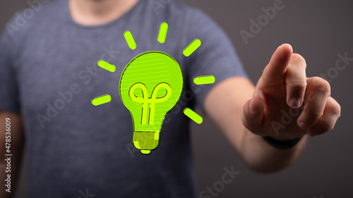 hand holding eco light bulb...