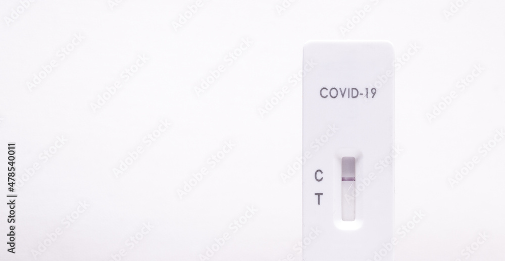COVID-19 (SARS-CoV-2) rapid antigen test kit (Colloidal gold), for self-testing, with negative result. Copy space on white background. COVID-19 (SARS-CoV-2) rapid antigen test kit (Colloidal gold), for self-testing, with negative result. Copy space on white background.