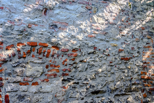 Brick and concrete surface of a wall