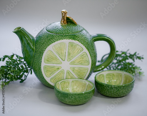 Teapot lime green. Handmade ceramic tea set