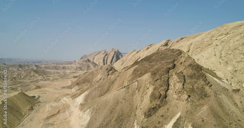 Aerial view of HaMakhtesh HaKatan (a geological erosional landform crater) outer walls and it's entrance Aerial view of HaMakhtesh HaKatan (a geological erosional landform crater) outer walls and it's entrance