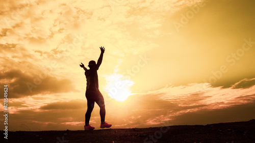 The men s silhouettes are extremely happy. men s silhouette He was raising his hands with joy and freedom. freedom concept