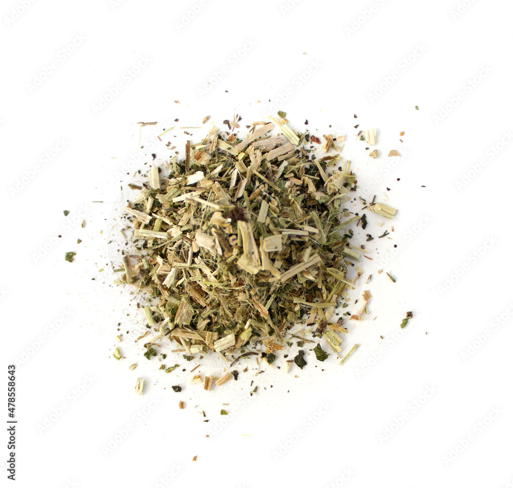 Dried chopped herb on white isolated background Dried chopped herb on white isolated background