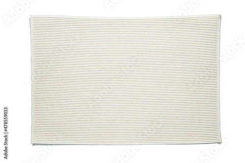 Top view of beige woven rectangular placemat, isolated