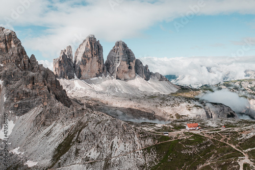 Tre Cime di Laveredo, three spectacular mountain peaks in Tre Cime di Lavaredo National Park, Sesto Dolomites, South Tyrol, Italy photo