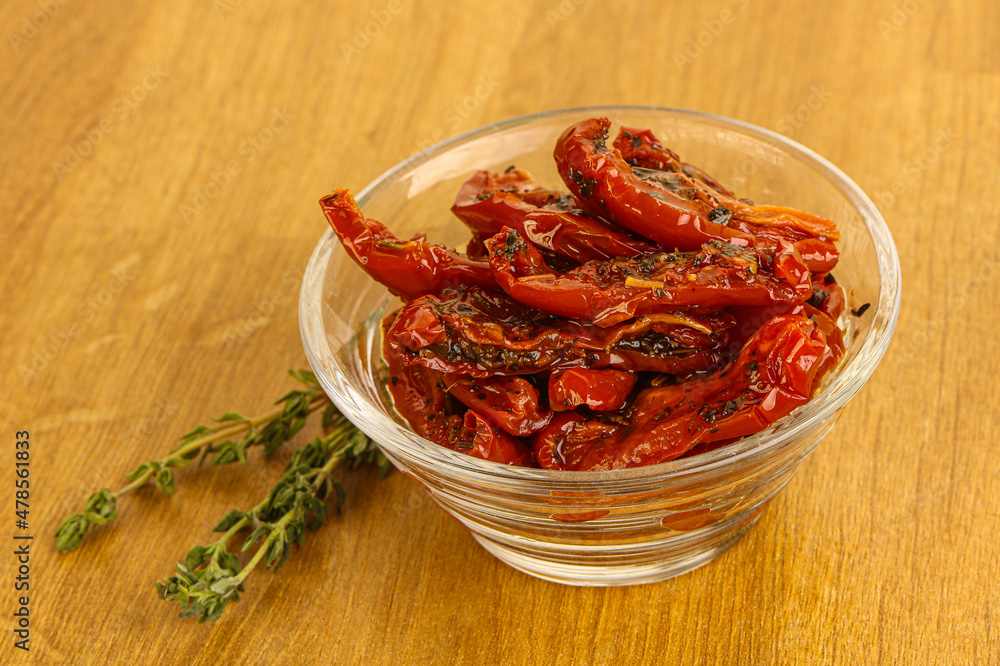 Sun-dried natural Italian tomato in the bowl Sun-dried natural Italian tomato in the bowl