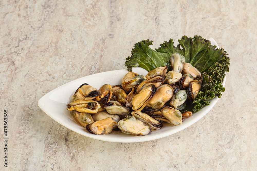 Tasty marinated mussels in the bowl Tasty marinated mussels in the bowl