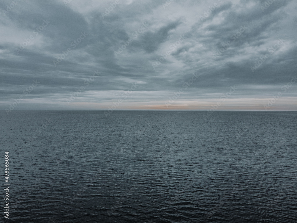 Fototapeta premium Clouds over the endless sea