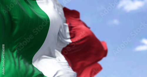 Detail of the national flag of Italy waving in the wind on a clear day