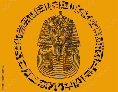 Brwon Ancient Tutankamon Pharao mask with hieroglyphics and yellow background. 