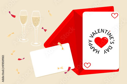 Festive Valentines day card composition with envelope, blank card and two glasses of chapagne photo