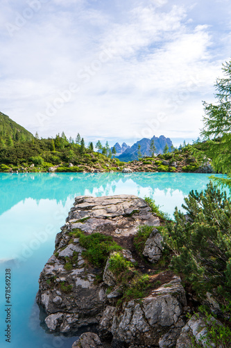 Lake Sorapis Italian Dolomites, Morning with clear sky on Lago di Sorapis in Italian Dolomites, lake with unique turquoise color water in Belluno province in Nothern Italy.