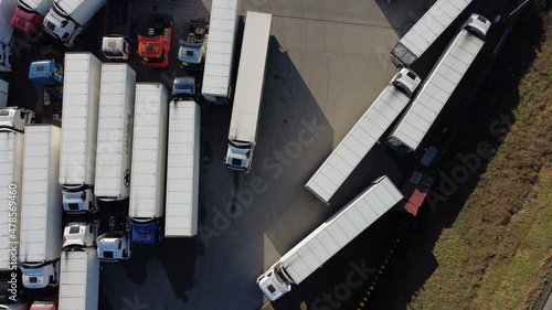 Aerial shot of a large truck parking lot, a logistics center for transporting goods across the country and abroad photo
