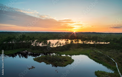 gorgeous sunset on a bog lake in estonia © Santi