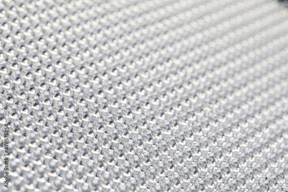 Naklejka premium Fragment of a LED panel with a shallow depth of field. Photo-video light. Close-up.