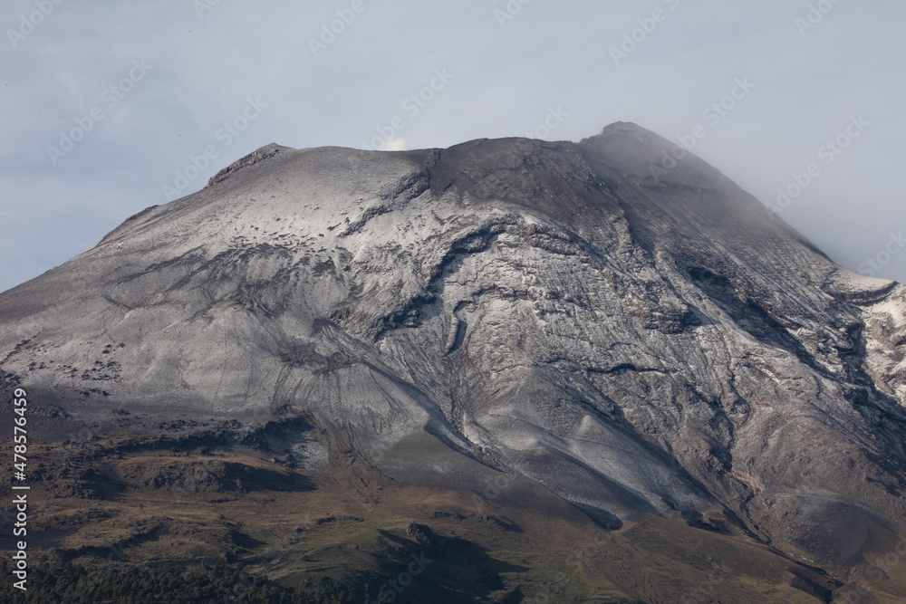 Popocatepetl crater with little snow seen from the side