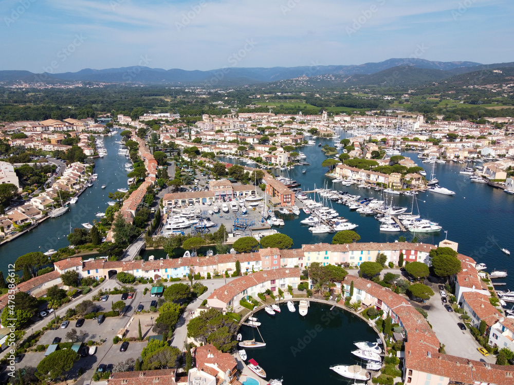Fototapeta premium Aerial view on small houses and sailboats of Port Grimaud and port Cogolin, French Riviera, Provence, France