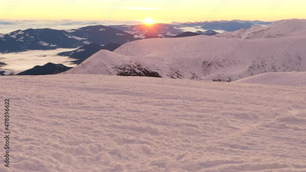 video panorama from the top of Goverla to winter Montenegro at dawn, the bright rays of the Sun blind the eyes video panorama from the top of Goverla to winter Montenegro at dawn, the bright rays of the Sun blind the eyes