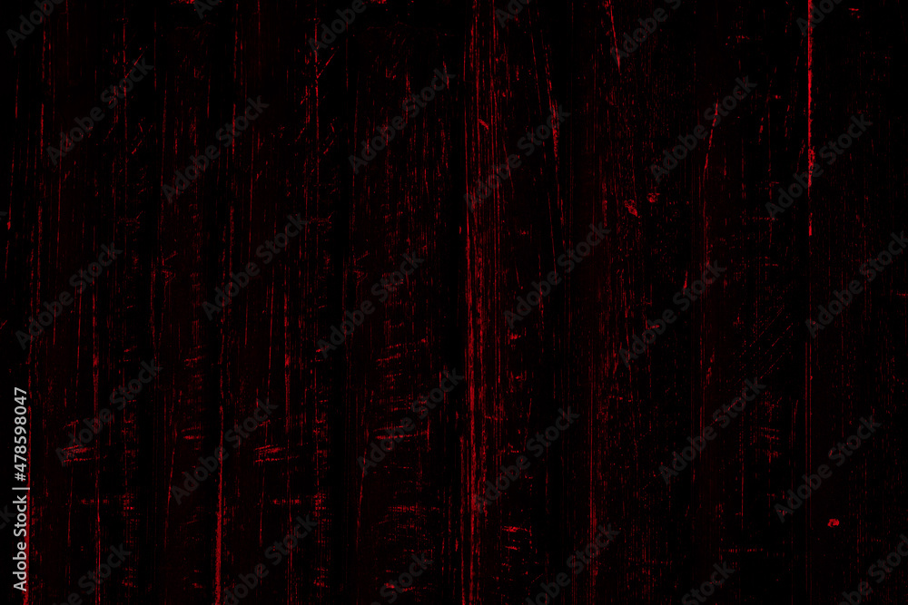 Red scratches texture on an old metal sheet surface for background Red scratches texture on an old metal sheet surface for background