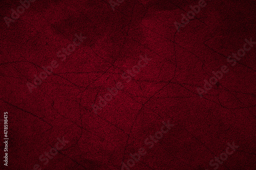 Black scratches on a red cement plaster wall for texture background