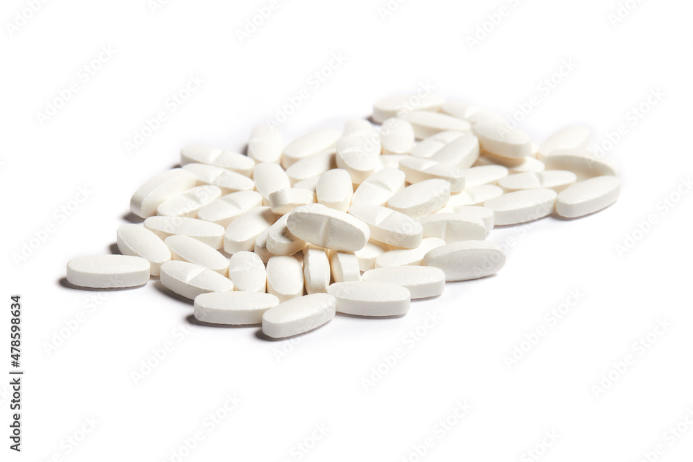 White pills on the white background. Health care concept White pills on the white background. Health care concept