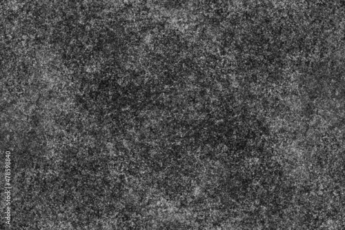 Scattered heavy grunge texture on a rough cement plaster wall for background