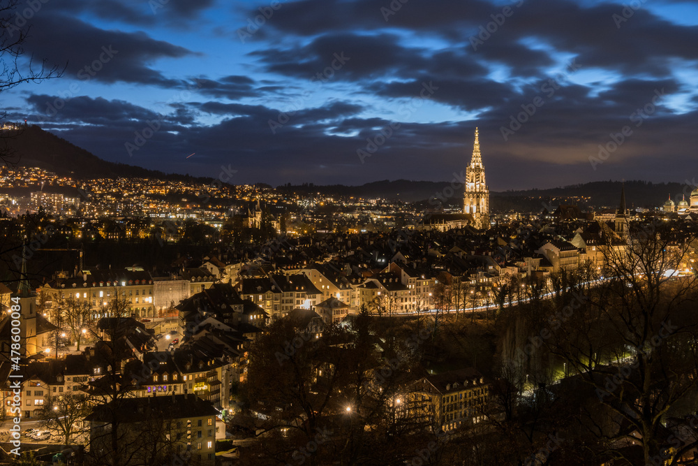 BERNE, BERN/SWITZERLAND, January 05, 2022, Scenic view to old town of Berne during the blue hour, capital of Switzerland
