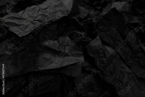 Abstract black paper texture background. Top view.