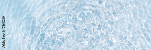 Banner of watery blue and clean surface with ripple effect and circles from drops, top view. Perfect transparent background.