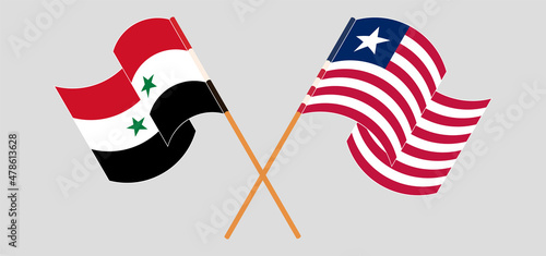 Crossed and waving flags of Syria and Liberia